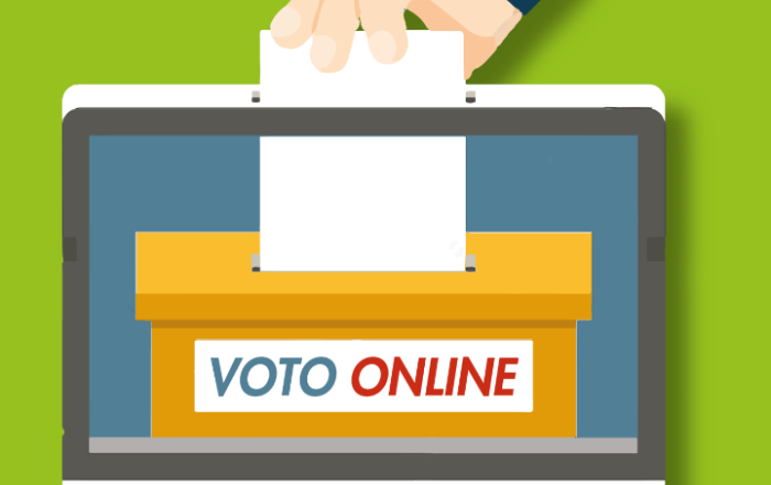 immagine di un monitor che contiene un'urna elettorale con una mano che introduce una scheda di voto